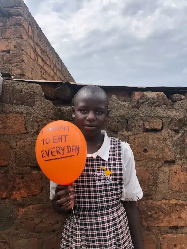 Mitchell Donah student in shining star center of orphans