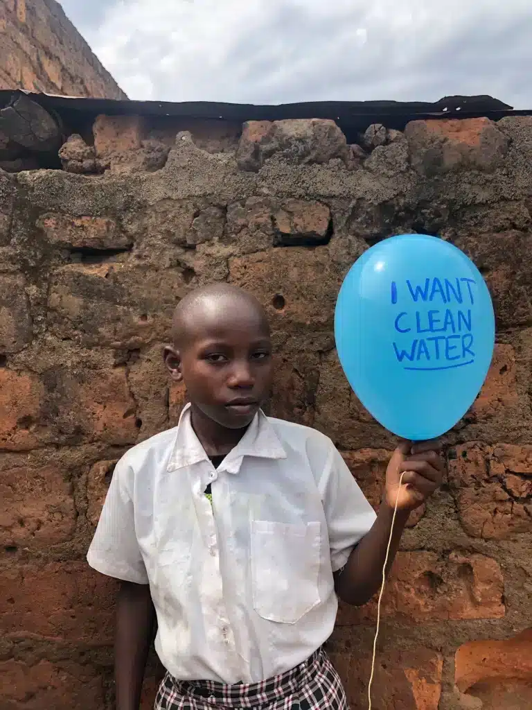 Steve Biko student in shining star center of orphans