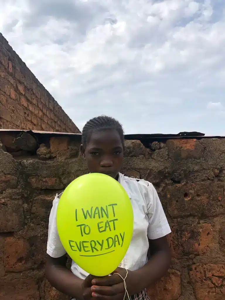 Tashline Iscar student in shining star center of orphans